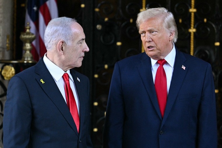 US President Donald Trump greets Israeli Prime Minister Benjamin Netanyahu