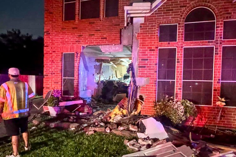 Tesla Crashes Through Katy House.