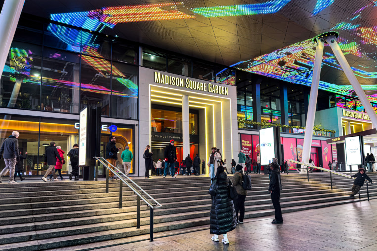 Crowd outside Madison Square Garden entrance at night, Seventh Avenue, Manhattan, New York City, New York, USA