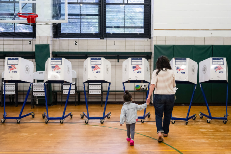 A voter arrives to cast their ballot at a polling location.