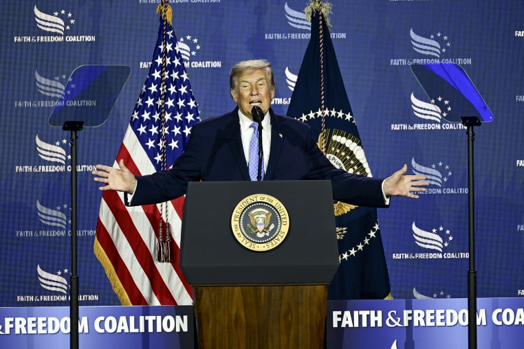 Donald Trump speaking at a podium with the Presidential seal on it.