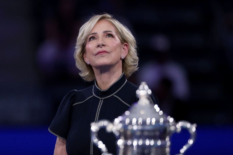 Chris Evert stands near the U.S. Open Women's Championship trophy in 2025.