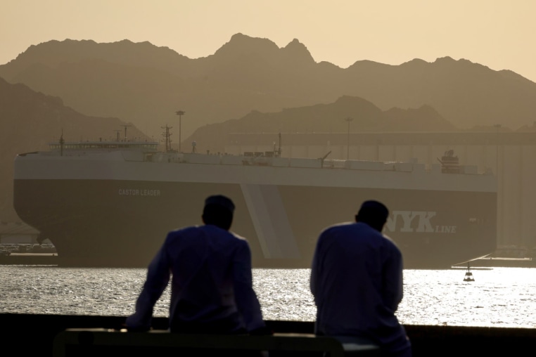Commercial vessels and oil tankers preparing to transit through the Strait of Hormuz, one of the most critical strategic waterways for global trade flows, maintain their wait in the Gulf of Oman, on June 17, 2026.