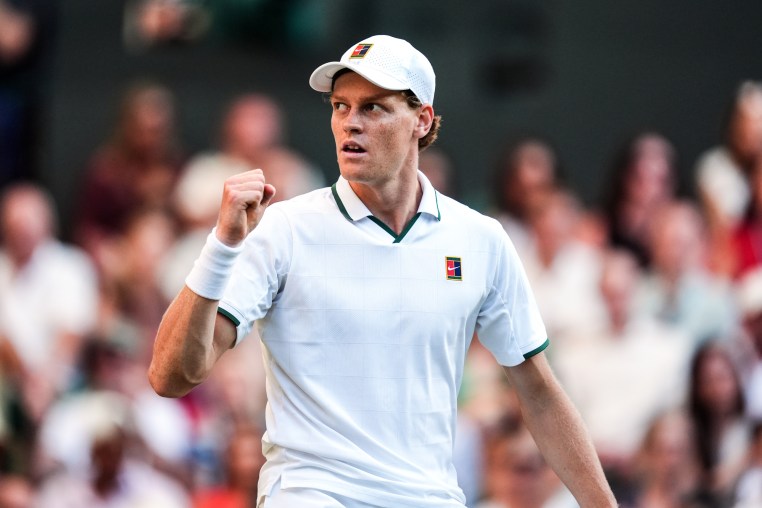 Jannik Sinner puts a fist in the air