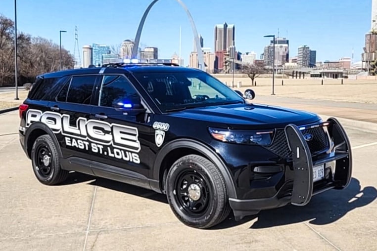 An East St. Louis Police vehicle is parked outside