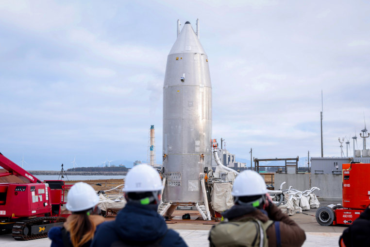 A photo shows the RV-X, a small Reusable Vehicle Experiment.