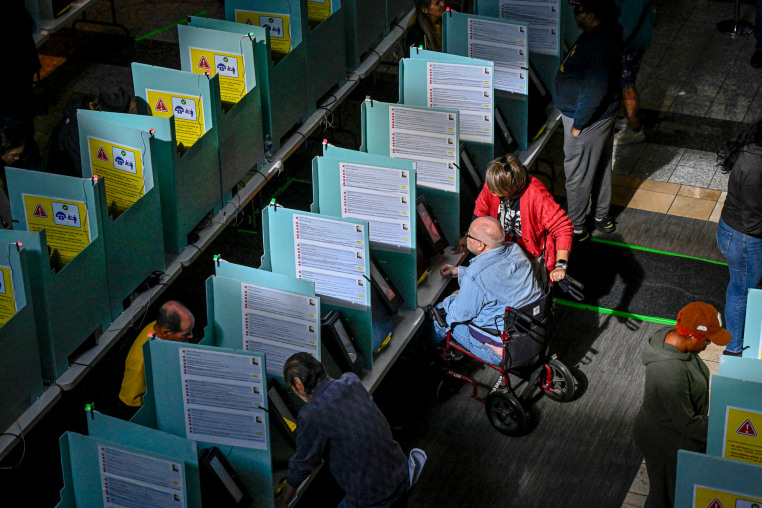 Voters cast their ballots.