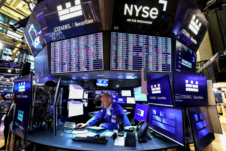 A trader works on the floor of the New York Stock Exchange