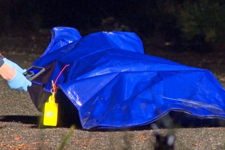 A bag covered in plastic, the item in which was later determined as a life like doll and not remains of a human body, leading to the Australian police calling off a homicide investigation, in Oallen, New South Wales, Australia August 9, 2026, in this screengrab from a handout video.