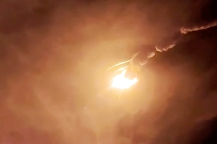 China's Long March 7A rocket appears to break apart after it exploded during liftoff from the Wenchang space launch site, in the southern island province of Hainan/