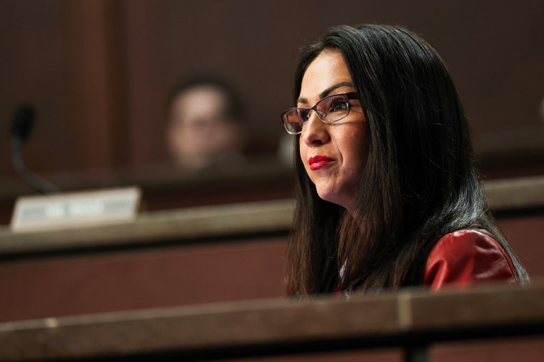 Lauren Boebert seated in a hearing room