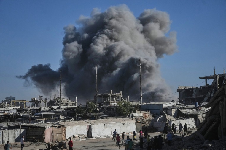 Smoke rises following a strike.