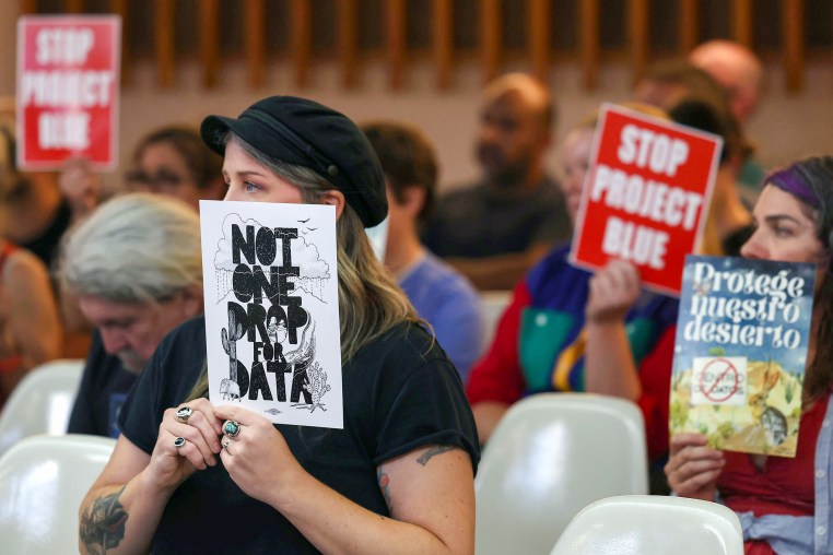 People protest data centers.