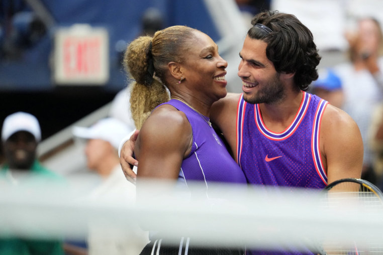 USA's Serena Williams and Spain's Carlos Alcaraz react after winning their mixed doubles match against New Zealand's Erin Routliffe and Britain's Lloyd Glasspool at the 2026 US Open tennis tournament at the USTA Billie Jean King National Tennis Center in New York on August 25, 2026. (Photo by TIMOTHY A. CLARY / AFP via Getty Images)