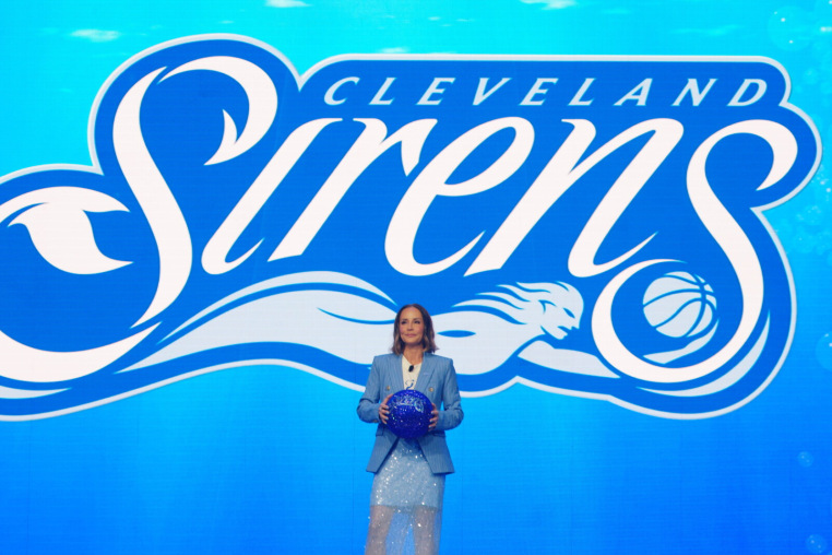 Allison Howard, president of the Cleveland Sirens, takes the stage at the event to debut the name of the 2028 WNBA expansion team at Rocket Arena in Cleveland, Ohio on Aug. 4, 2026.