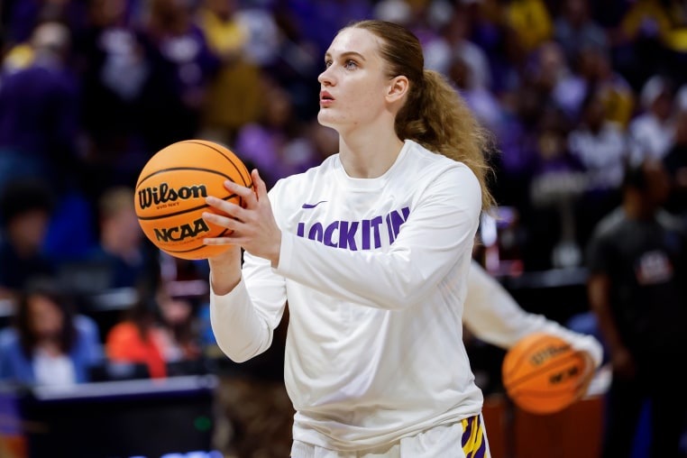 Kate Koval #13 of the LSU Tigers warms up before a basketball game.