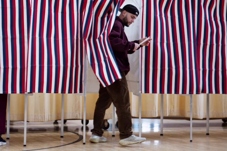 Voters cast their ballots in the New Hampshire primary on Jan. 22, 2024 in Laconia. 