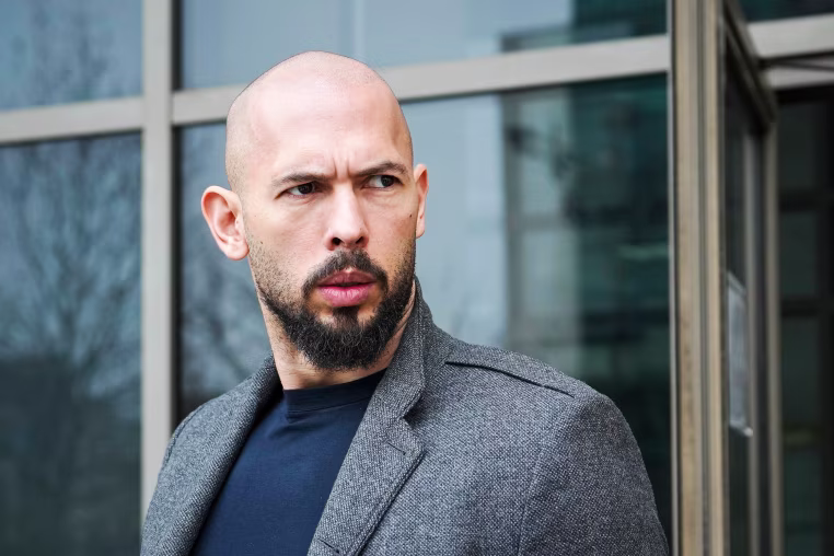 Online influencer Andrew Tate detained in Romania, handed U.K. arrest warrant, his spokesperson says.