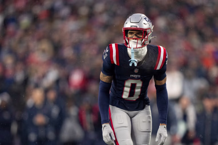 FOXBOROUGH, MASSACHUSETTS - JANUARY 18: Christian Gonzalez #0 of the New England Patriots lines up during an NFC Divisional Playoff game against the Houston Texans at Gillette Stadium on January 18, 2026 in Foxborough, Massachusetts. (Photo by Michael Owens/Getty Images)