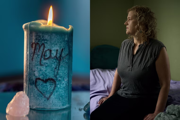 A memorial candle engraved with May's name and a heart; Elyse Thorpe sits on May's bed.