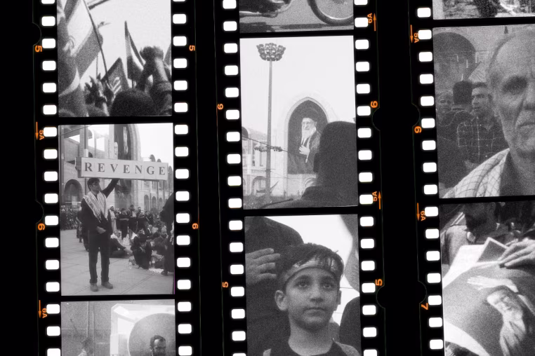 A contact sheet of film strips showing black and white images taken in Iran during the Ayatollah's funeral.