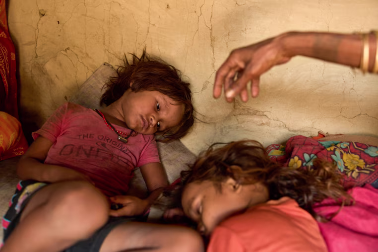 Sonam Mukhiya and Yubraj Mukhiya lay on the floor