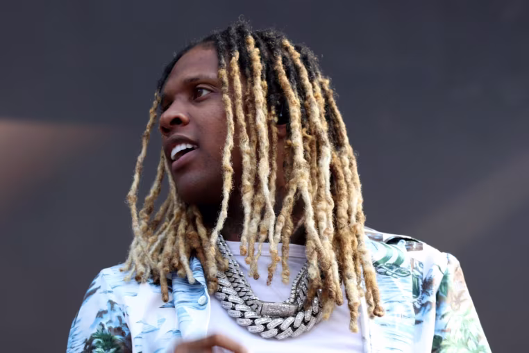 Alt: Lil Durk performs at Lollapalooza on July 30, 2022, in Chicago's Grant Park.