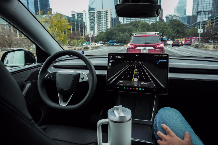 A Tesla Robotaxi view from the inside of the car.