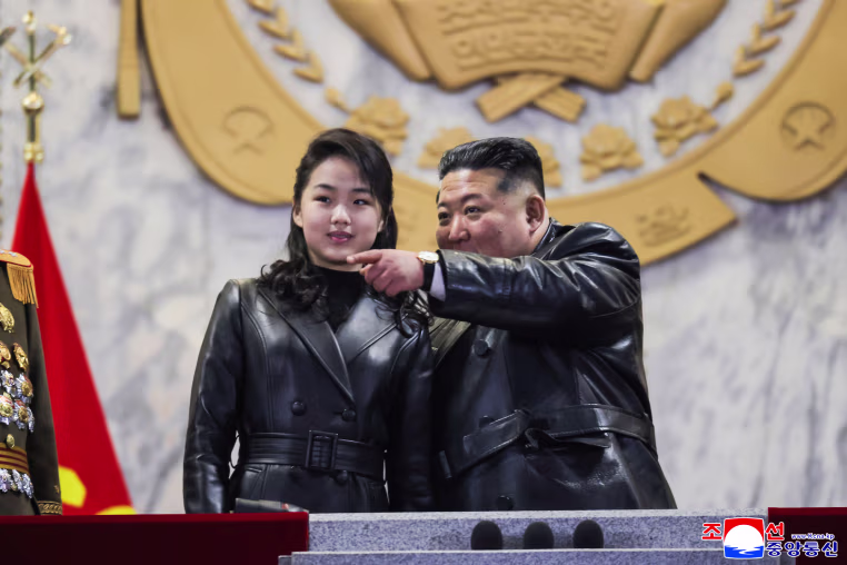 Kim Jong Un and his daughter.
