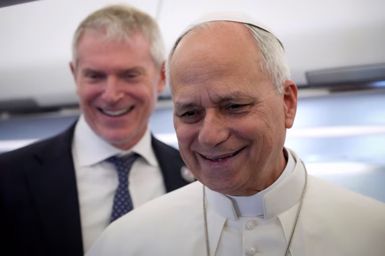 Pope Leo XIV speaks to reporters on the flight from Rome to Paris 