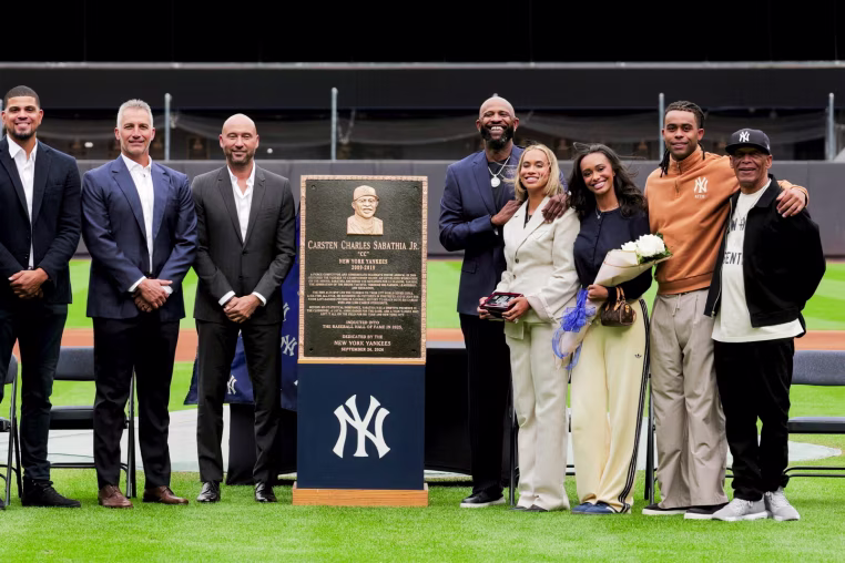 NEW YORK, NY - SEPTEMBER 25: CC Sabathia poses for a photo with family and former members of the New York Yankees after being honored at Yankee Stadium prior to the game between the Baltimore Orioles and the New York Yankees on Friday, September 25, 2026 in New York, New York. (Photo by Michael Mooney/MLB Photos via Getty Images)