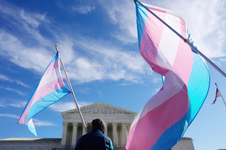A protest with Trans pride flags outside the US Supreme Court in Washington, Jan. 13, 2026. 