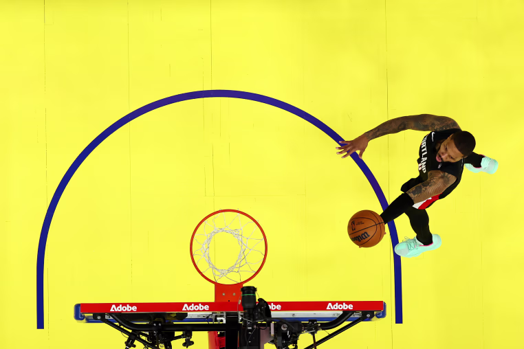 Damian Lillard of the Portland Trail Blazers goes up for a layup against the Golden State Warriors 