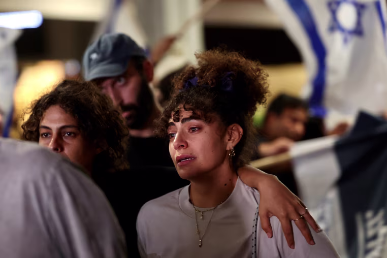 Israel's main television channels broadcast their arrival at Ben Gurion Airport live, where they were met by paramedics and social workers. 
