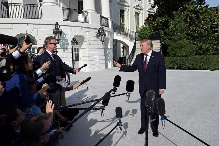 Donald Trump speaking to reporters outside the White House
