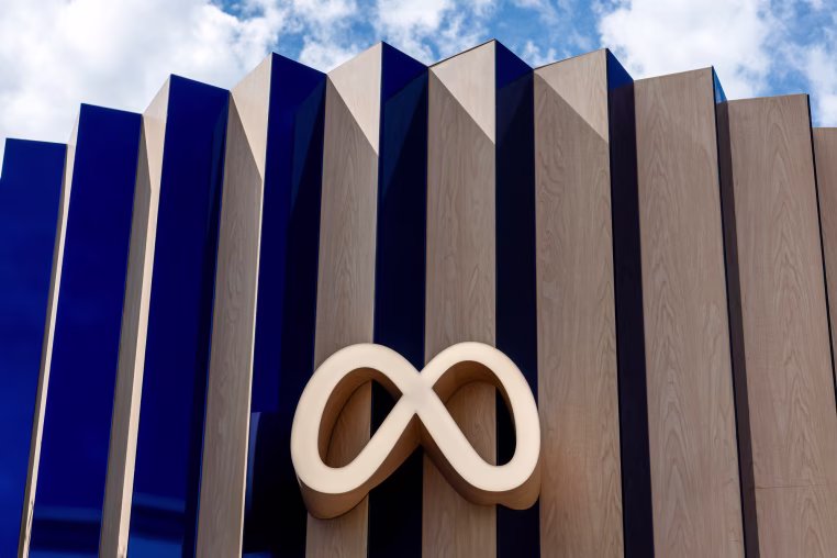 The Meta infinity symbol on the exterior facade of a building