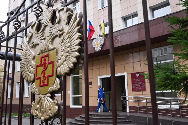Russian officials downplayed reports that a laboratory technician in Siberia had died of plague, insisting the situation was under control and that post-mortem tests had not found traces of the disease. 
