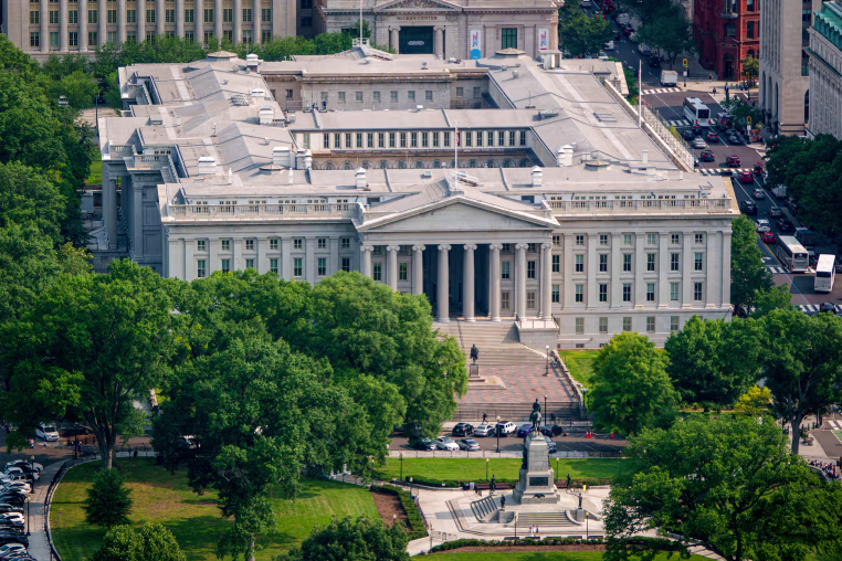 The U.S. Treasury Department headquarters building is seen from the Washington Monument.
