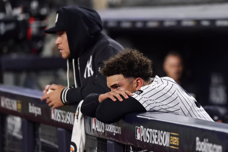 New York Yankees react after being defeated by the Tampa Bay Rays.