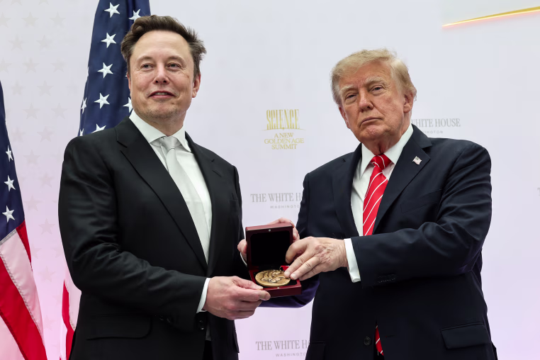 Tesla and SpaceX CEO Elon Musk (L) receives the National Medal of Science from U.S. President Donald Trump.