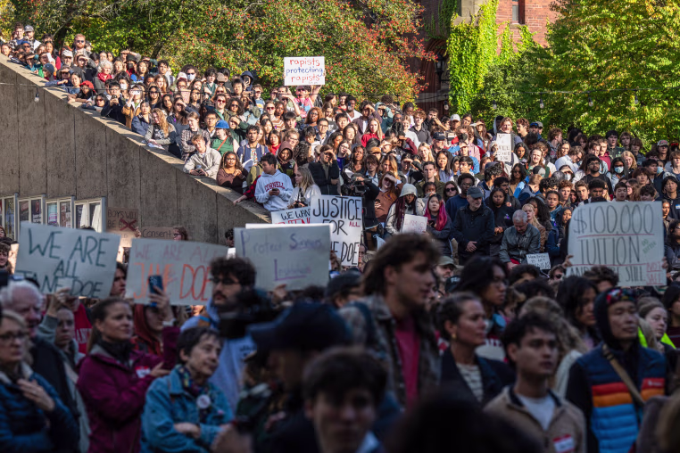 People protest.