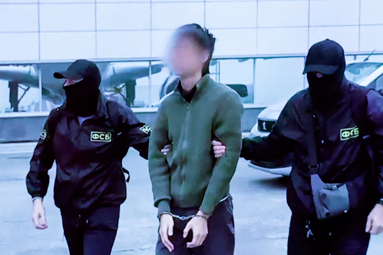 TOPSHOT-RUSSIA-JAPAN-ARREST