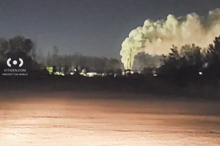 Image: Plumes of smoke rising in the distance.