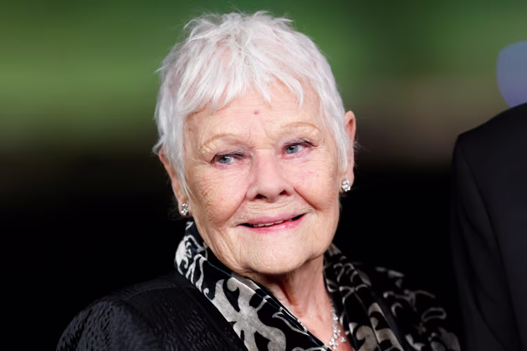 Judi Dench smiles