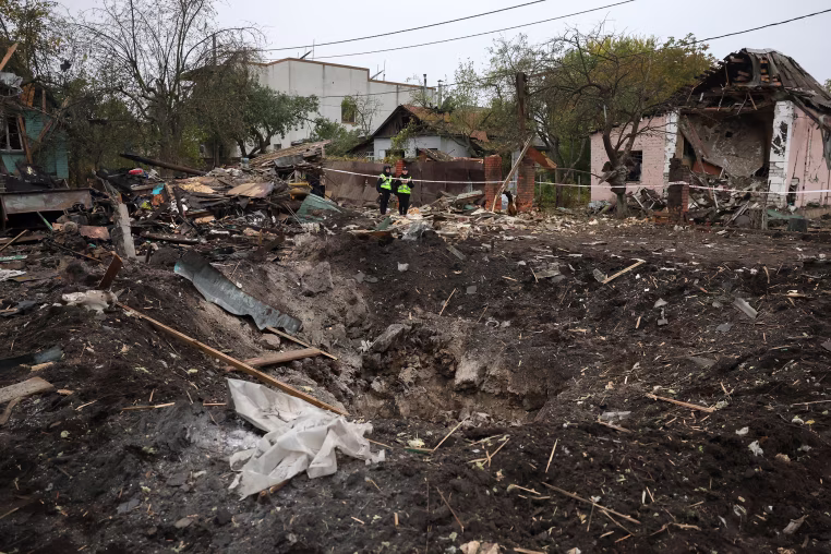 Image: A crater at the site of a missile strike in Kyiv