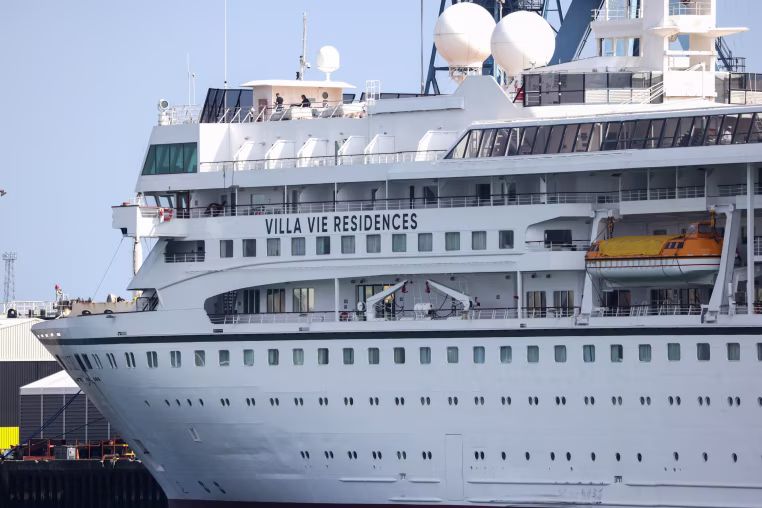 The Odyssey, a U.S. cruise docked at a harbour.