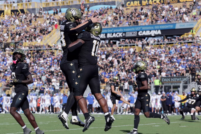ORLANDO, FLORIDA - OCTOBER 24: Landen Chambers #11 of the UCF Knights  celebrates his touchdown in the first quarter of the game between the UCF Knights and BYU Cougars at Acrisure Bounce House on October 24, 2026 in Orlando, Florida. (Photo by Dustin Markland/Getty Images)