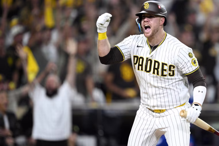 SAN DIEGO, CALIFORNIA - SEPTEMBER 30: Gavin Sheets #30 of the San Diego Padres celebrates after hitting a two-run home run against the Chicago Cubs during the fourth inning in game two of the National League Wild Card Series at Petco Park on September 30, 2026 in San Diego, California.  (Photo by Orlando Ramirez/Getty Images)
