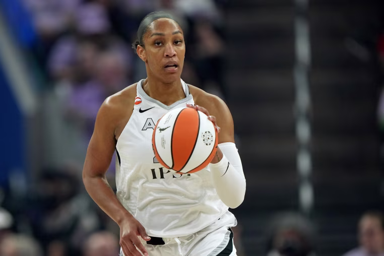 SAN FRANCISCO, CALIFORNIA - OCTOBER 07: A'ja Wilson #22 of the Las Vegas Aces dribbles the ball up court against the Golden State Valkyries in the first half during Game Two of the Semifinals at Chase Center on October 7, 2026 in San Francisco, California. NOTE TO USER: User expressly acknowledges and agrees that, by downloading and/or using this photograph, User is consenting to the terms and conditions of the Getty Images License Agreement. (Photo by Thearon W. Henderson/Getty Images)