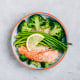 Healthy lunch bowl salmon and broccoli with asparagus and rice